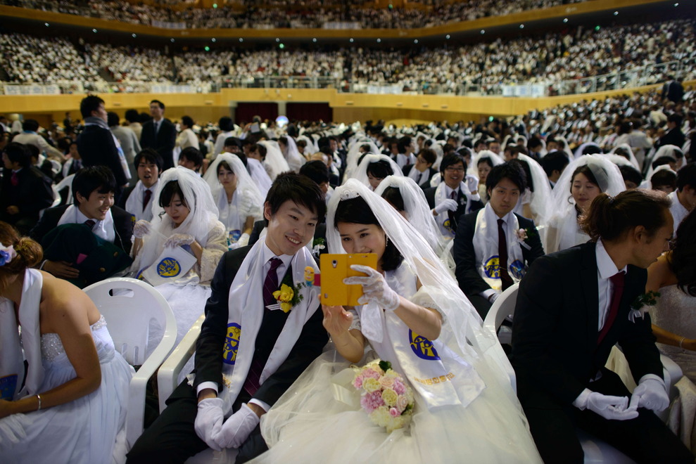 Et av mange bilder VG brukte i sin nettutgave 13. februar 2014 fra massebryllupet i Sør-Korea dagen før VG130214-2